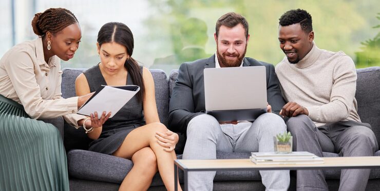 business-people-couch-teamwork-with-laptop-office-project-paperwork-brainstorming-collaboration-men-women-diversity-with-b2b-partnership-creative-campaign-meeting